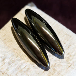 pair of polished hematite ovals