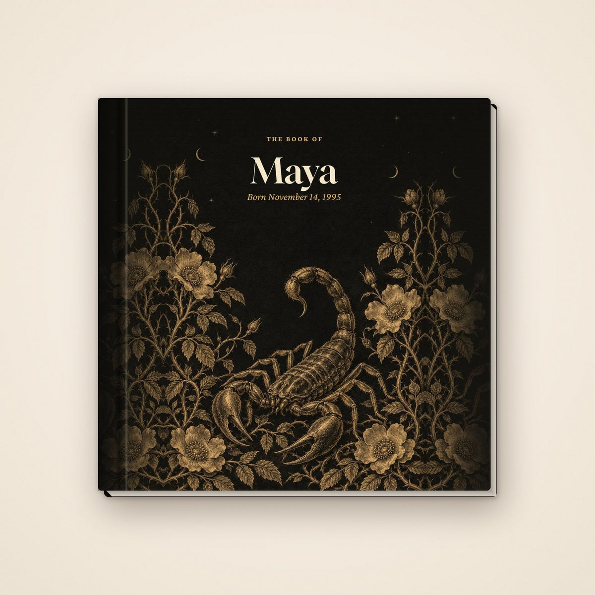 The hardcover with a name and birth date on the front